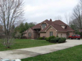 Two-story brick w bsm't on wooded, creek side in Foxcliff North. Master on main. Three beds up. Formal dine. Breakfast rm. Hearth rm. Kitchen w raised bar island. Two-story foyer & living room. Balcony overlook from open stair rail upper hall