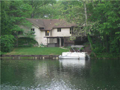 Lake/Water View: LAKEFRONT ! More LAKEFRONT. Two sided view. Raised ceiling(s), one level cedar & brownstone over lower level walkout. 4 beds. 2.5 baths. Updated kitchen & baths. Cul-de-sac location on LAKE EAST. Very private. Big windows view lake from a