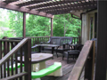 Deck: Passage from main level breakfast family dining area onto deck. Deck 1 overlooks deck 2. # 2 overlooks open concrete patio. Patio passage to lakeside dock.