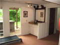 Living Room: Lower level walk out basement with wet bar. Passage to open patio at lakeside with dock. Hot tub optional. Mechanical, bath, social, recreation, another masonry fireplace with brick hearth. 4th bedroom in lower level with egress window.