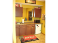 Convenient to lower deck outside area, yet just off the recreation / social area, the wet bar combines a part of game table area. The lower level has a complete mechanical / off season storage room. The crawl space is adapted for additional storage