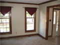 Removable, stained window muttins, double hung windows for traditional presentation, wide casings and tall baseboards.
Netural decor, hard surface passage flooring from foyer through kitchen and breakfast. All rooms ceiling lighting.