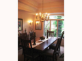 Ceiling tray. Arched window glass views formal entry garden.