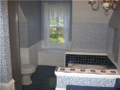 Hall Bath adjacent upper level bedrooms. Cute with schmultz and pizaze. Dormer windows with seat bench. Tiled tub surround, curved glass shower, and seperated dual vanities
