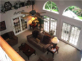 Upper bed hall balcony overlook into formal living area.