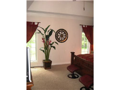 Tray ceiling, walk-in closet, passage to den/library/office from bed area in addition to foyer hall passage, full view window glass, beautiful casings and crowns.