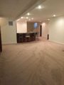 Basement: Lower level is well lighted basement recreation area, tiled floor, crawl & cubby storage, corner gas fireplace with (work in progress) ceramic tiled surround. Full 3rd bath with tub/shower, laundry room, and 4th egress bedroom. No steps to garag