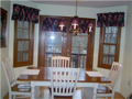 Breakfast Area/Room: Bay panorama of back wooded area and Foxcliff Lake South from breakfast area deck. Hardwood floors create hard surface for easy maintenance and natural beauty.