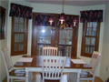 Breakfast Area/Room: Bay panorama of back wooded area and Foxcliff Lake South from breakfast area deck. Hardwood floors create hard surface for easy maintenance and natural beauty.