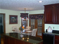 Breakfast Area/Room: Bay panorama of back wooded area and Foxcliff Lake South from breakfast area deck. Hardwood floors create hard surface for easy maintenance and natural beauty.