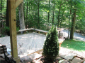 Deck: 2" x 4" decking of treated lumber, painted on underside. Seat bench.
