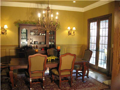 Dining Room: Raised ceiling. East window wall with north exit slider glass door to spacious patio / screen porch (work in progress). Hardwood floor. Balcony overlook to great room