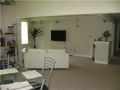 Family Room: Lower level walkout rooms read: fireplace/TV social area, recreation/play area, lower level kitchen, lower level laundry room, full bath, two beds, each with slider glass to walkout with lake view.

Family Room: Lower level walkout rooms read