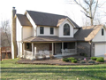 Exterior Front: PERFECT ! Situated above wooded ravine overlook Foxcliff South Lake. Open lawn to south side and east front. Two story center hall traditional American home with walk out lower level. Bonus rm above two car attached (with storage offset). 