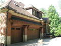 Garage: Very spacious two car built in garage. Many storage cabinets blt in. Gar door operators. Access to lower level of home on hard surface ceramic tile for laundry, full 3rd bath, recreation area, and 4th bed/closet with egress window.