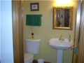 Half Bath: Tasteful decor. Neutral coloration throughout home. Quality fixtures in lighting and plumbing selections. Clean and costly. Seller price offering does not relate to their higher cost basis and cost per square foot calculations. Appraised over 3