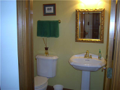 Half Bath: Tasteful decor. Neutral coloration throughout home. Quality fixtures in lighting and plumbing selections. Clean and costly. Seller price offering does not relate to their higher cost basis and cost per square foot calculations. Appraised over 3