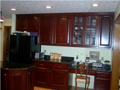 Kitchen: Lineal footage of counters is exceptional. Corner glass above sink captures lake view through mature trees. Recessed can lighting, wide passage around center island, ample space to both sides of cook top, good time and motion to wash and dishwash