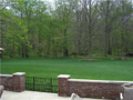 Walled patio, gated for animals or small children, gradual slope to wooded creekside. Sand bottom creek from adjacent hatchery is clean and full of goldfish. Like the fish, if you elect to escape the boundaries of daily life and work place, find home