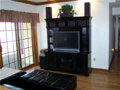 Rec/Play Room: Lower Level Walkout: Glass slider walkout to patio and wooded back west area. Lake access. Hardwood floor, nice ceiling height, brick interior wall accent, full bed and bath, laundry room, mechanical room is large enough for additional stor