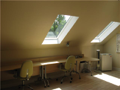 Studio: Complete working office above garage. Bath access. Access from spiral staircase within the garage.